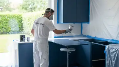 Cabinet painting in Greensboro, NC for a kitchen makeover by Greensboro Paint Pros